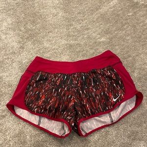 Nike red running shorts